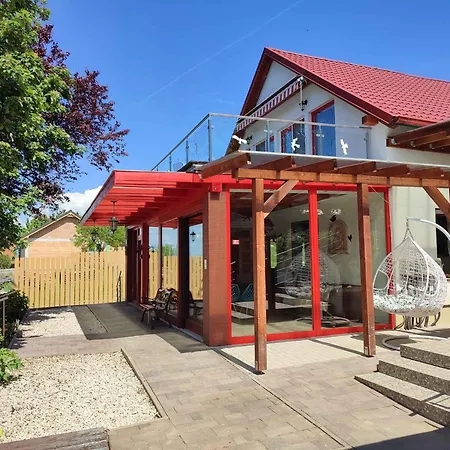 In Prázdninový dům *